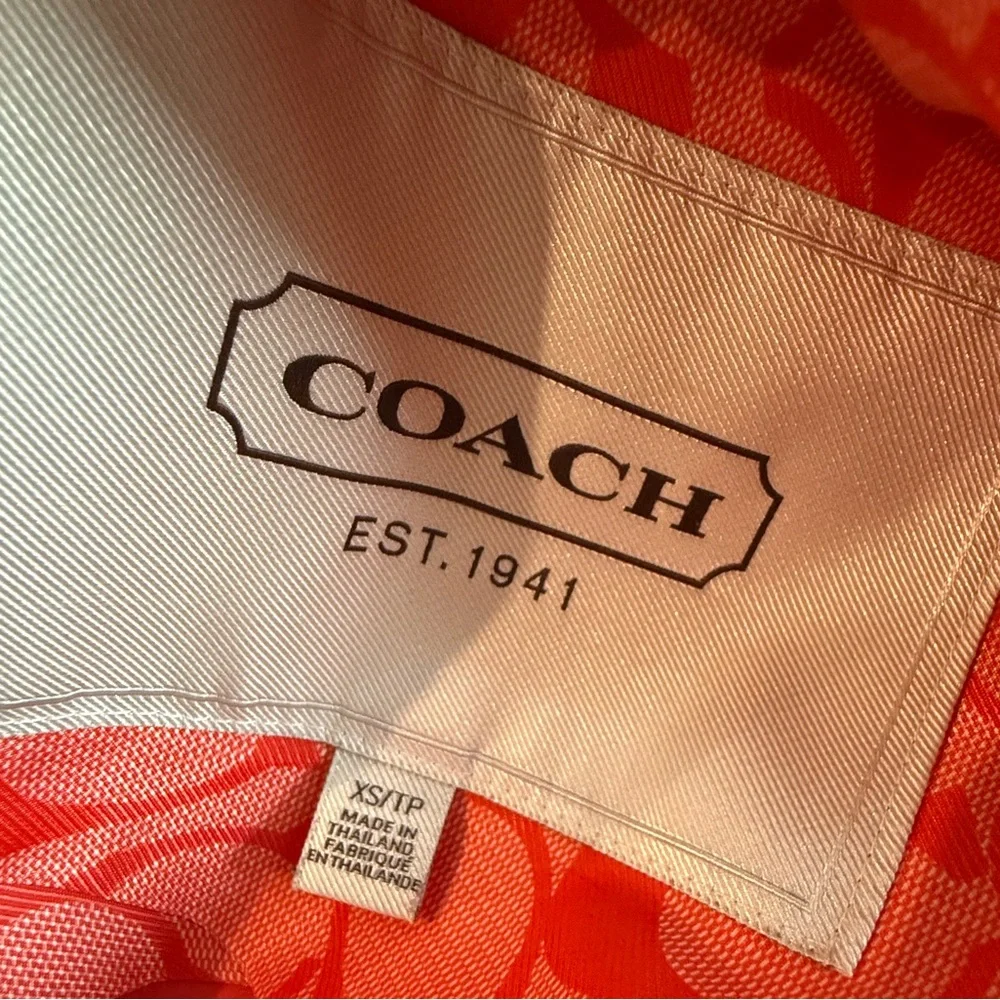 Coach. Utility Rain Jacket. Coral. Size XS.